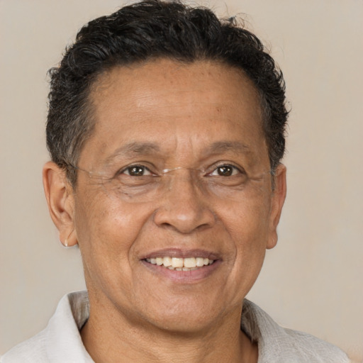 Joyful white middle-aged male with short  brown hair and brown eyes