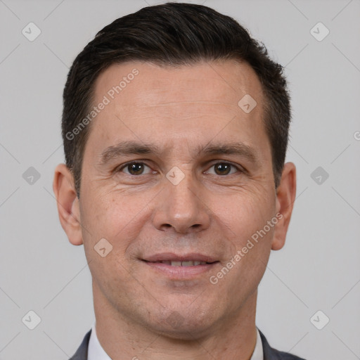 Joyful white adult male with short  brown hair and brown eyes