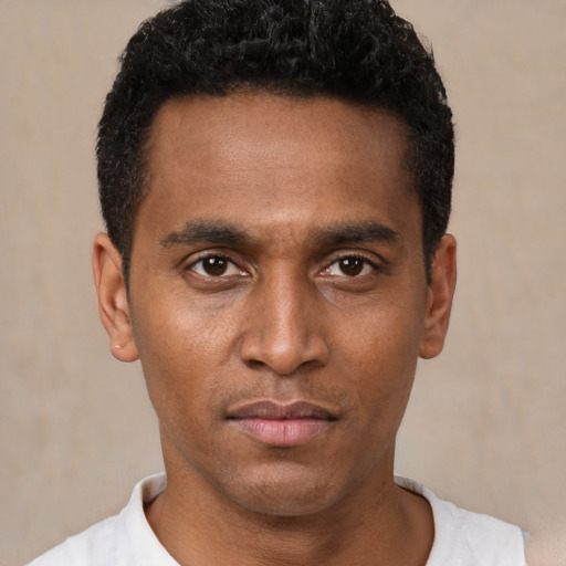 Neutral black young-adult male with short  black hair and brown eyes