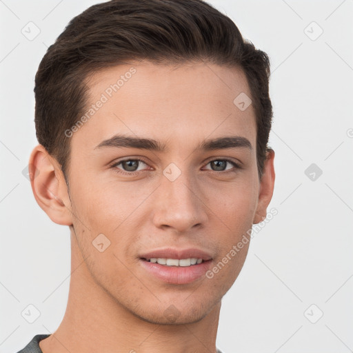 Joyful white young-adult male with short  brown hair and brown eyes