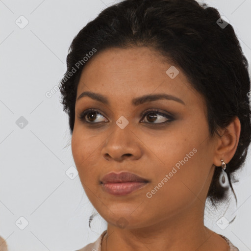 Joyful latino young-adult female with medium  black hair and brown eyes