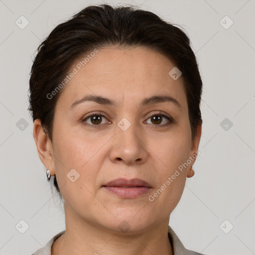 Joyful white adult female with short  brown hair and brown eyes