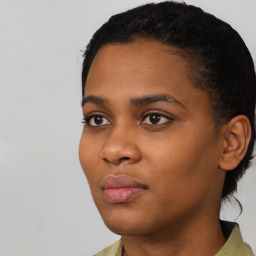 Neutral black young-adult female with short  black hair and brown eyes