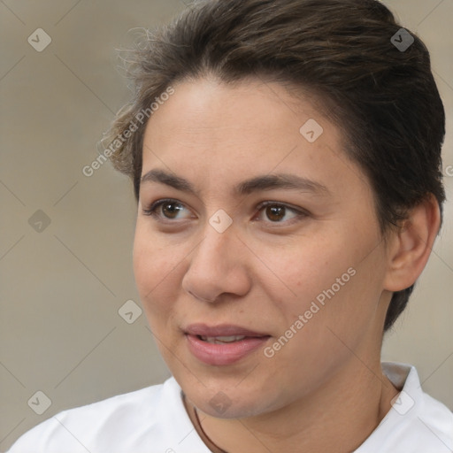 Joyful white adult female with short  brown hair and brown eyes