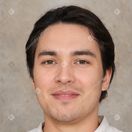 Joyful white adult male with short  brown hair and brown eyes