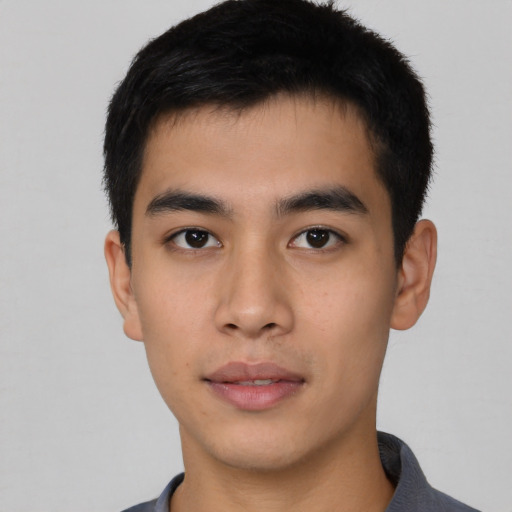 Neutral asian young-adult male with short  black hair and brown eyes