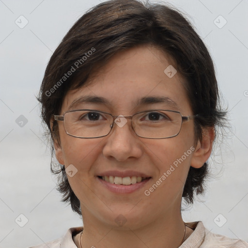 Joyful white adult female with medium  brown hair and brown eyes