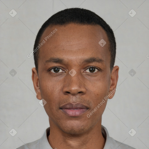 Neutral black young-adult male with short  black hair and brown eyes