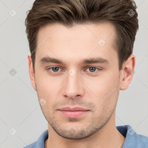 Neutral white young-adult male with short  brown hair and brown eyes