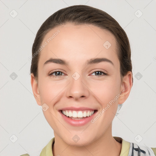 Joyful white young-adult female with medium  brown hair and brown eyes