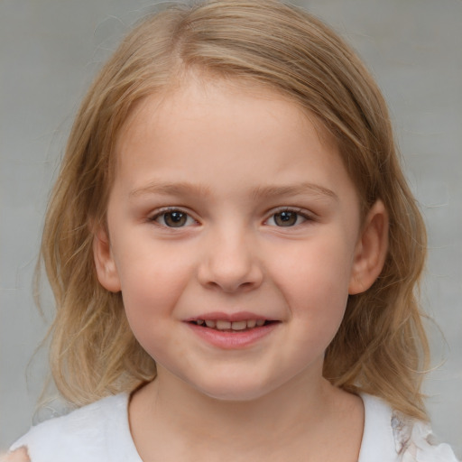 Joyful white child female with medium  brown hair and blue eyes