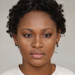 Neutral black young-adult female with short  brown hair and brown eyes