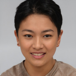 Joyful asian young-adult female with short  brown hair and brown eyes