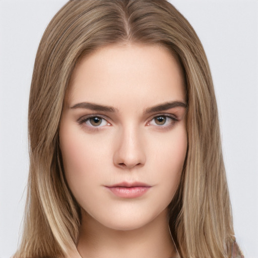 Neutral white young-adult female with long  brown hair and brown eyes