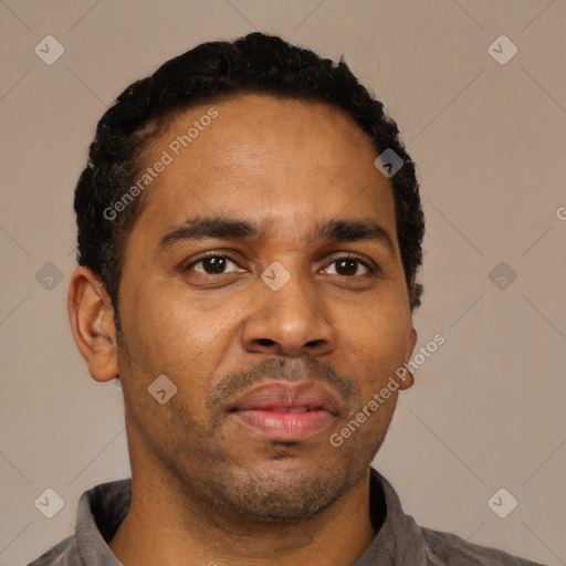 Neutral latino adult male with short  black hair and brown eyes