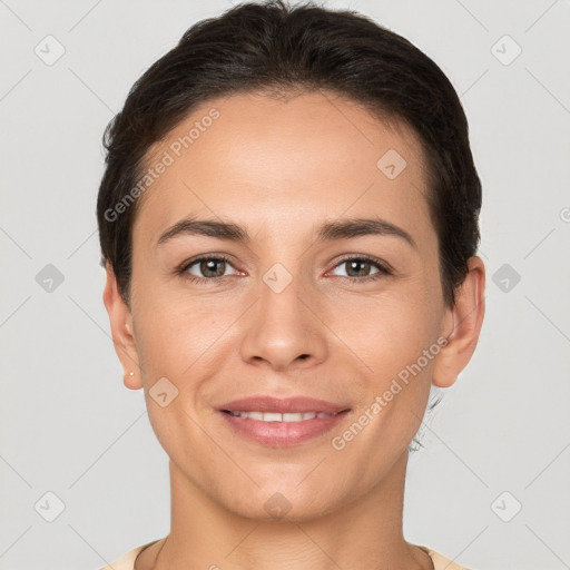 Joyful white young-adult female with short  brown hair and brown eyes