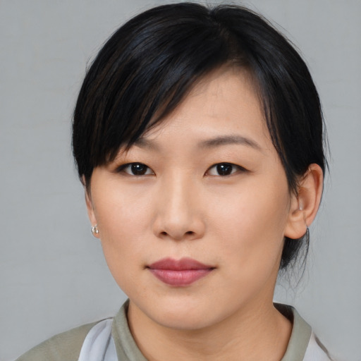 Neutral asian young-adult female with medium  black hair and brown eyes
