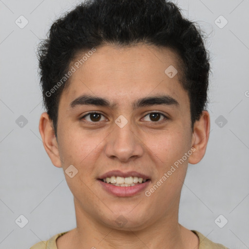 Joyful latino young-adult male with short  brown hair and brown eyes