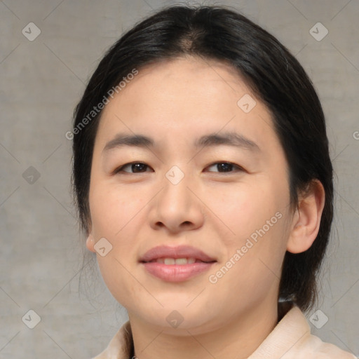 Joyful asian young-adult female with medium  brown hair and brown eyes