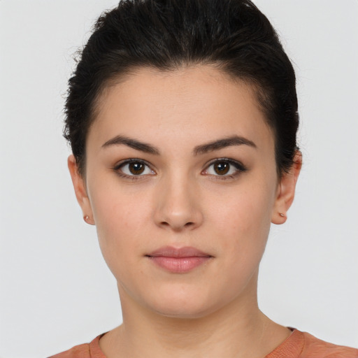 Neutral white young-adult female with short  brown hair and brown eyes