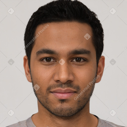 Neutral latino young-adult male with short  black hair and brown eyes