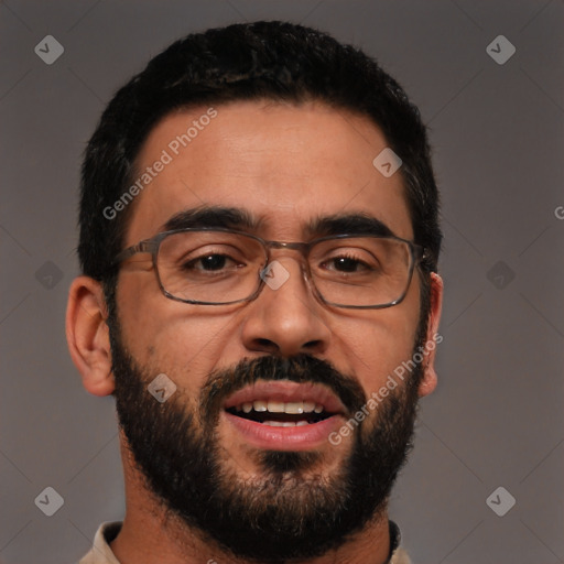 Joyful white young-adult male with short  black hair and brown eyes