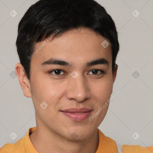 Joyful asian young-adult male with short  brown hair and brown eyes