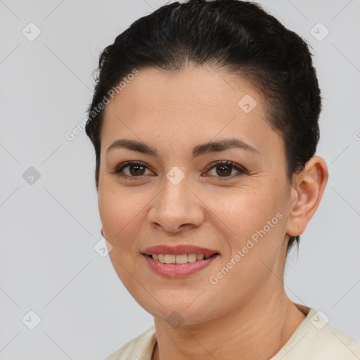 Joyful latino young-adult female with short  brown hair and brown eyes