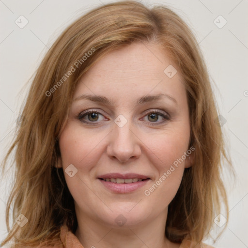 Joyful white young-adult female with medium  brown hair and blue eyes