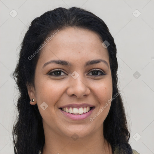 Joyful latino young-adult female with long  brown hair and brown eyes