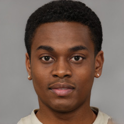 Neutral black young-adult male with short  brown hair and brown eyes