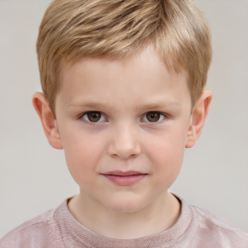 Joyful white child male with short  brown hair and grey eyes