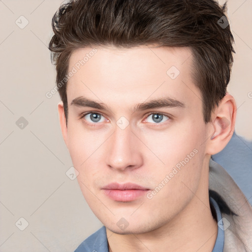 Neutral white young-adult male with short  brown hair and brown eyes