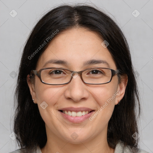 Joyful white adult female with medium  brown hair and brown eyes