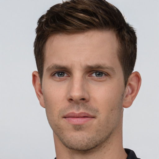 Neutral white young-adult male with short  brown hair and grey eyes