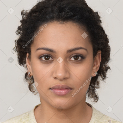 Neutral black young-adult female with medium  brown hair and brown eyes