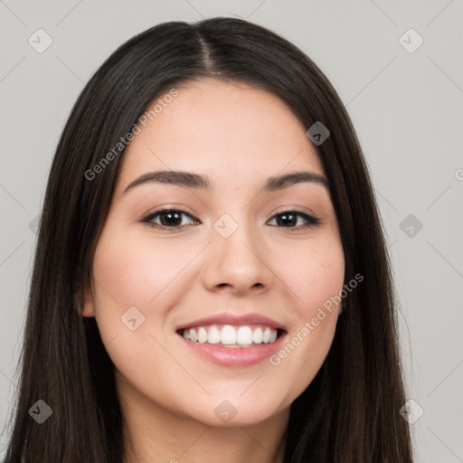 Joyful white young-adult female with long  black hair and brown eyes