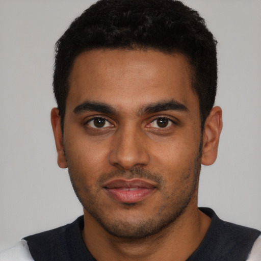 Neutral black young-adult male with short  black hair and brown eyes