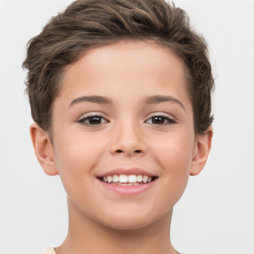 Joyful white child female with short  brown hair and brown eyes