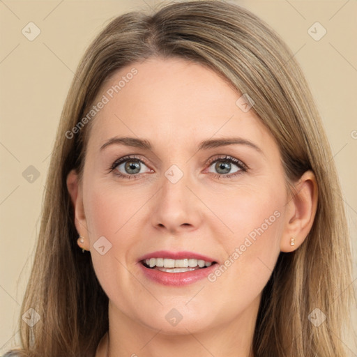 Joyful white young-adult female with long  brown hair and grey eyes