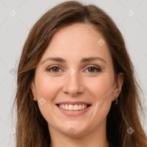 Joyful white young-adult female with long  brown hair and green eyes