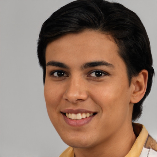 Joyful asian young-adult female with short  brown hair and brown eyes