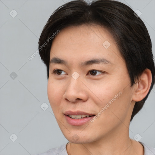 Joyful asian young-adult male with short  brown hair and brown eyes