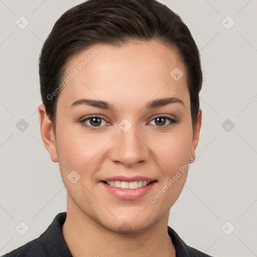 Joyful white young-adult female with short  brown hair and brown eyes