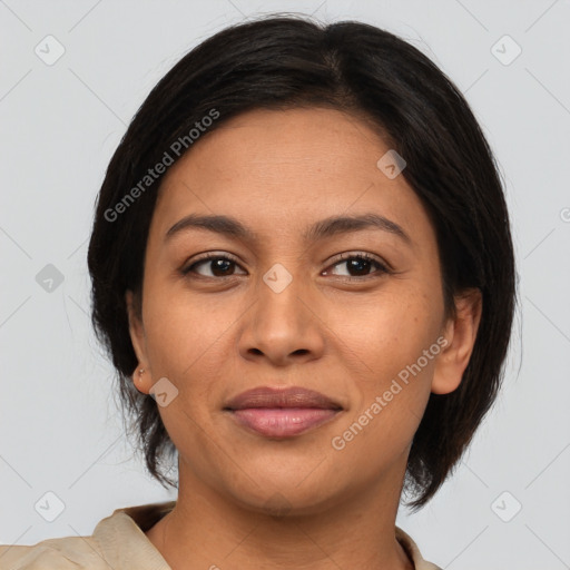 Joyful latino young-adult female with medium  brown hair and brown eyes