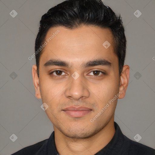 Joyful latino young-adult male with short  black hair and brown eyes