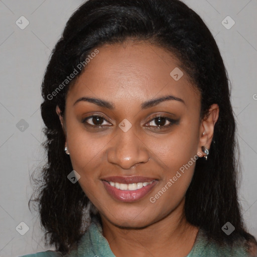 Joyful black young-adult female with long  brown hair and brown eyes