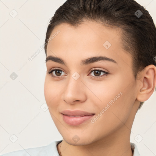 Joyful white young-adult female with short  brown hair and brown eyes