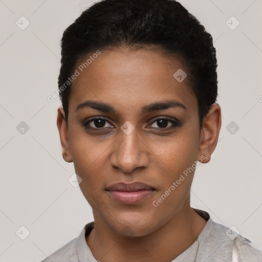 Joyful black young-adult female with short  black hair and brown eyes