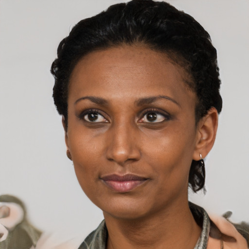 Neutral black young-adult female with short  black hair and brown eyes
